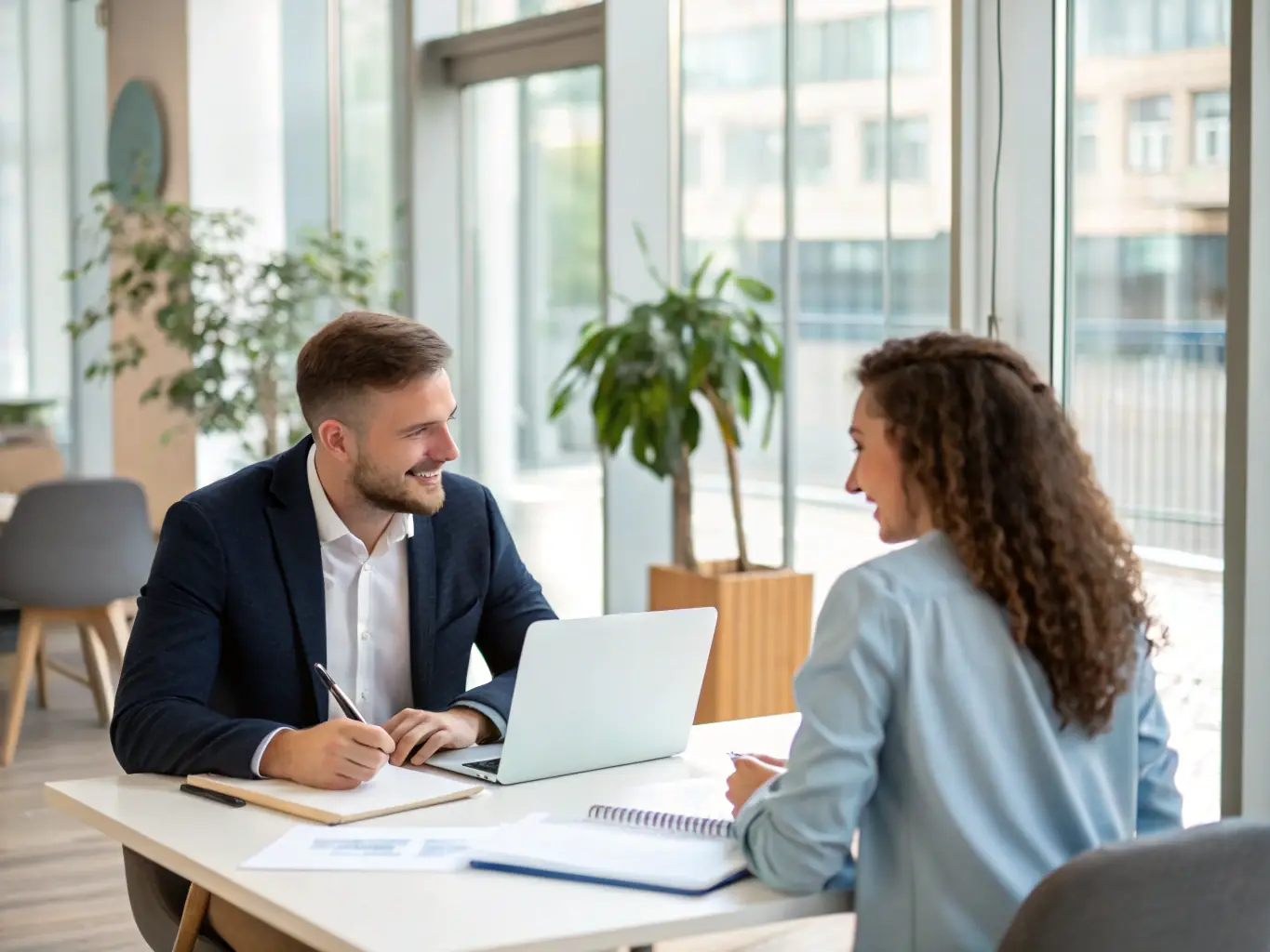 An image of an Indian professional confidently presenting their skills and experience during a mock interview session, with a coach providing constructive feedback.